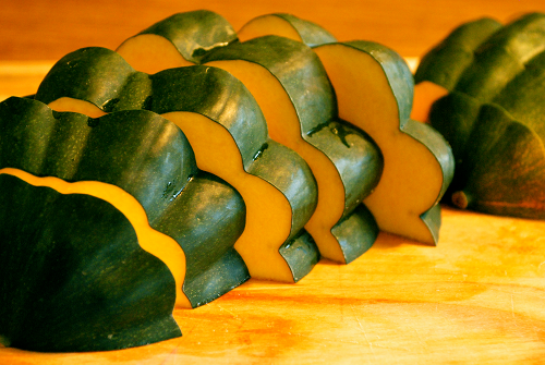 Sliced Raw Acorn Squash Roasted Acorn Squash recipe and images by Lacey Baier, a sweet pea chef