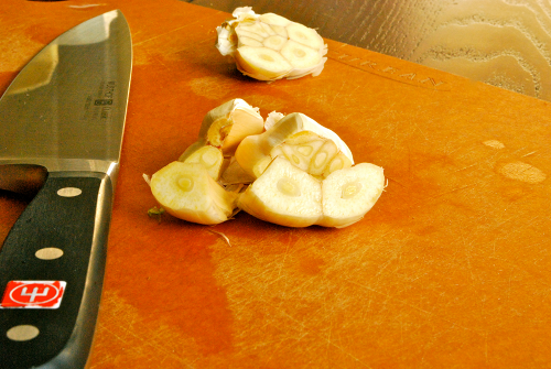 Halved Garlic Clove Making Chicken Stock recipe and images by Lacey Baier, a sweet pea chef