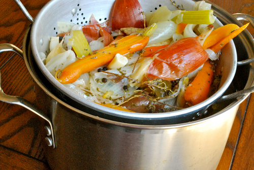 Straining the Solids Making Chicken Stock recipe and images by Lacey Baier, a sweet pea chef