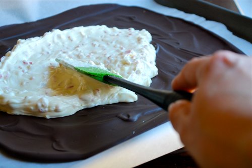 Spreading on the White Chocolate Peppermint Bark Recipe and images by Lacey Baier, a sweet pea chef
