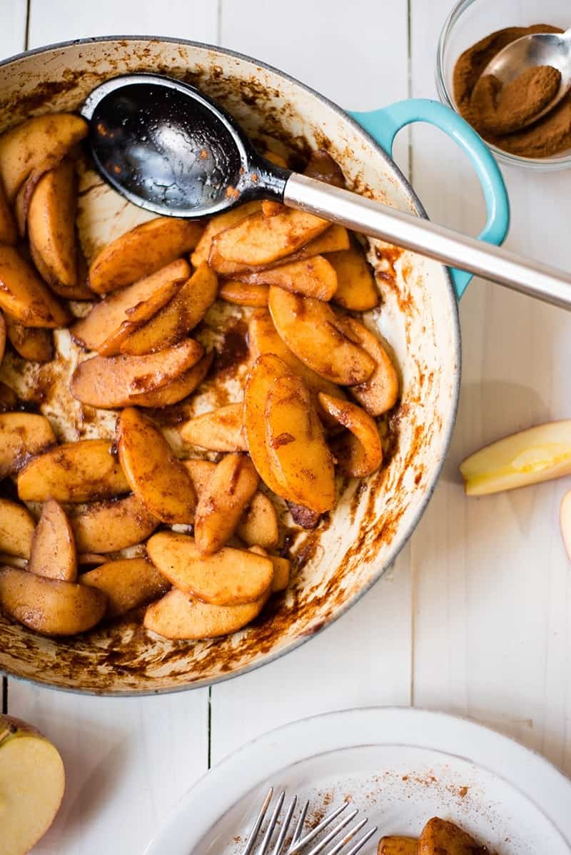 Cooked cinnamon apples in a skillet, ready to serve.