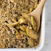 This Healthy Apple Crumble is apple and spice goodness, and a good-for-you crumble all rolled into one. With nuts, pepitas, and tasty cinnamon, this is a gluten-free clean eating dessert soon to be your next favorite!