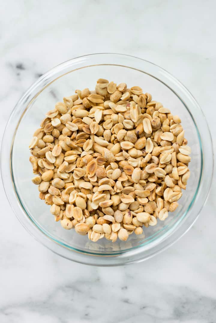 Overhead view of a bowl of peanuts, ready to be enjoyed as a healthy snack.