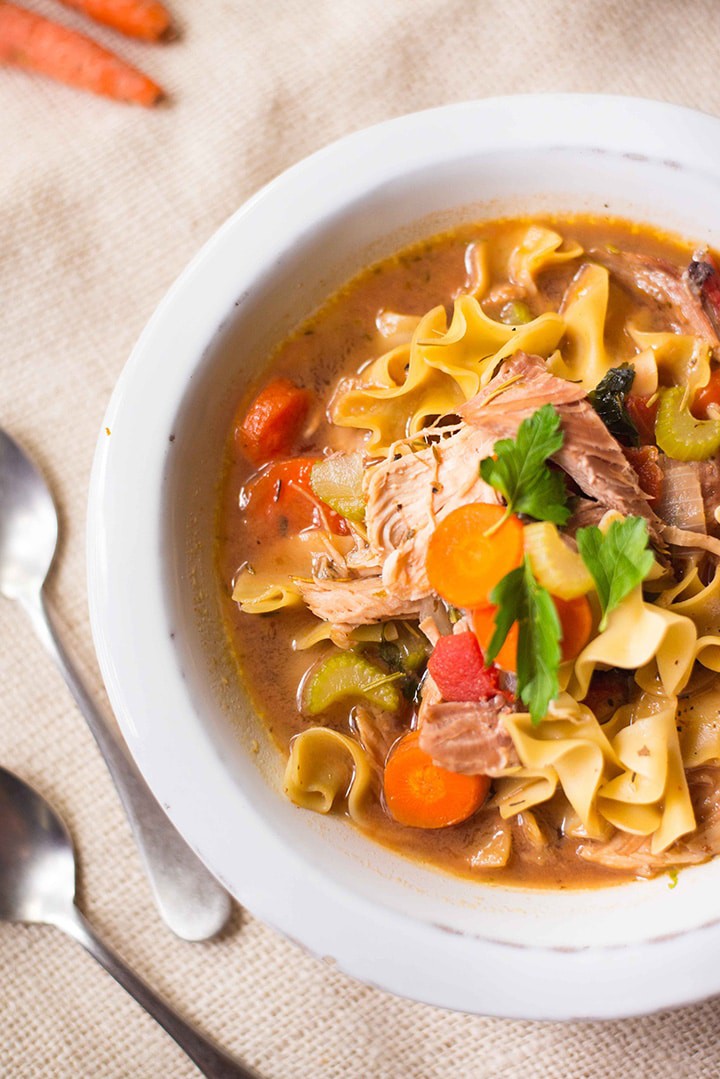 This Easy Turkey Noodle Soup is a great way to keep enjoying Thanksgiving turkey leftovers. This recipe is not only savory but healthy, too. Carrots, quinoa noodles, and tomatoes add extra flavor and nutrition to an already good-for-you soup!