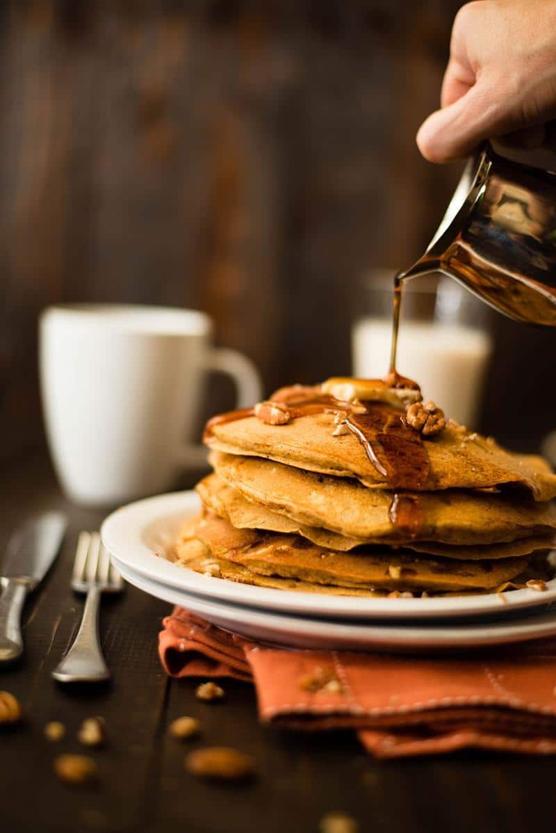 Fresh pumpkin puree is the star ingredient of these delicious, clean-eating Healthy Pumpkin Pancakes. One pancake just won’t be enough!