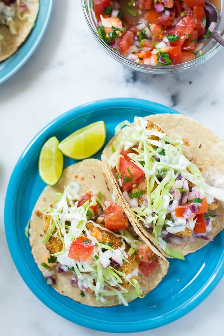 How to Make Baja Fish Tacos | Crispy, spicy, and fresh, these Baja Fish Tacos are a taco dream come true. The flavors stay balanced with a homemade Pico de Gallo and Creamy White Dill Sauce for your your fresh fish tacos. So dang delicious, you won’t know what hit you! Keep reading for a step-by-step guide on how to make Baja Fish Tacos! | A Sweet Pea Chef