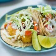 How to Make Baja Fish Tacos | Crispy, spicy, and fresh, these Baja Fish Tacos are a taco dream come true. The flavors stay balanced with a homemade Pico de Gallo and Creamy White Dill Sauce for your your fresh fish tacos. So dang delicious, you won’t know what hit you! Keep reading for a step-by-step guide on how to make Baja Fish Tacos! | A Sweet Pea Chef