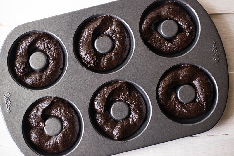 Chocolate Doughnuts | Delicious baked chocolate doughnuts with a chocolate glaze. www.asweetpeachef.com