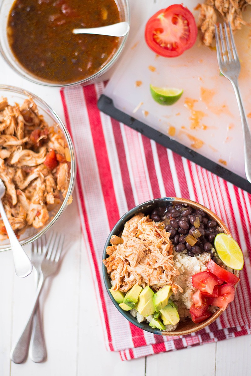Chicken burrito bowl together with bowls of shredded chicken and black beans , showing the process for how to make a chicken burrito bowl using a slow cooker.