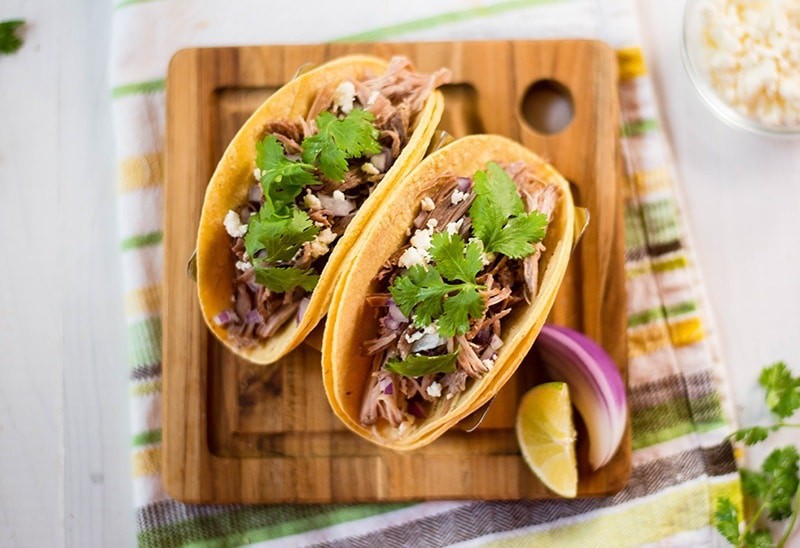 Slow Cooker Green Chile Pork Tacos | A healthy and easy way to get your green chile pork tacos fix at home! www.asweetpeachef.com