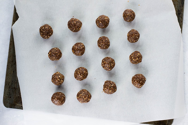 Overhead image of a tray of 16 No Bake Chocolate Peanut Butter Energy Balls.