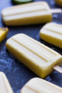 An easy and healthy summertime treat, theseÂ Spicy Pineapple Popsicles are only 4 ingredients and are sweetener free, dairy free, vegan, and paleo!