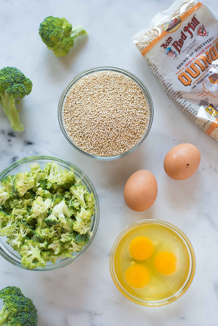 Ingredients laid out and ready to be mixed together to make the healthy egg muffin cups, including quinoa, broccoli, and eggs.