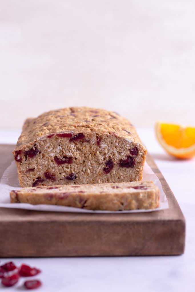 Are you looking for delicious, yet healthy Cranberry Orange Bread? This recipe has the perfect combination of tart and sweet without added sugar. Clean-eating ingredients make this a go-to bread for any occasion!