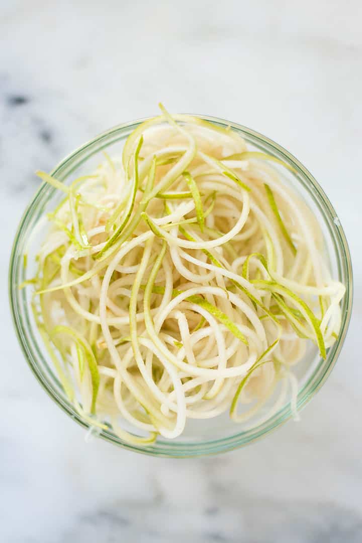Bowl filled with spiralized pear noodles to show spiralizer veggie recipe.