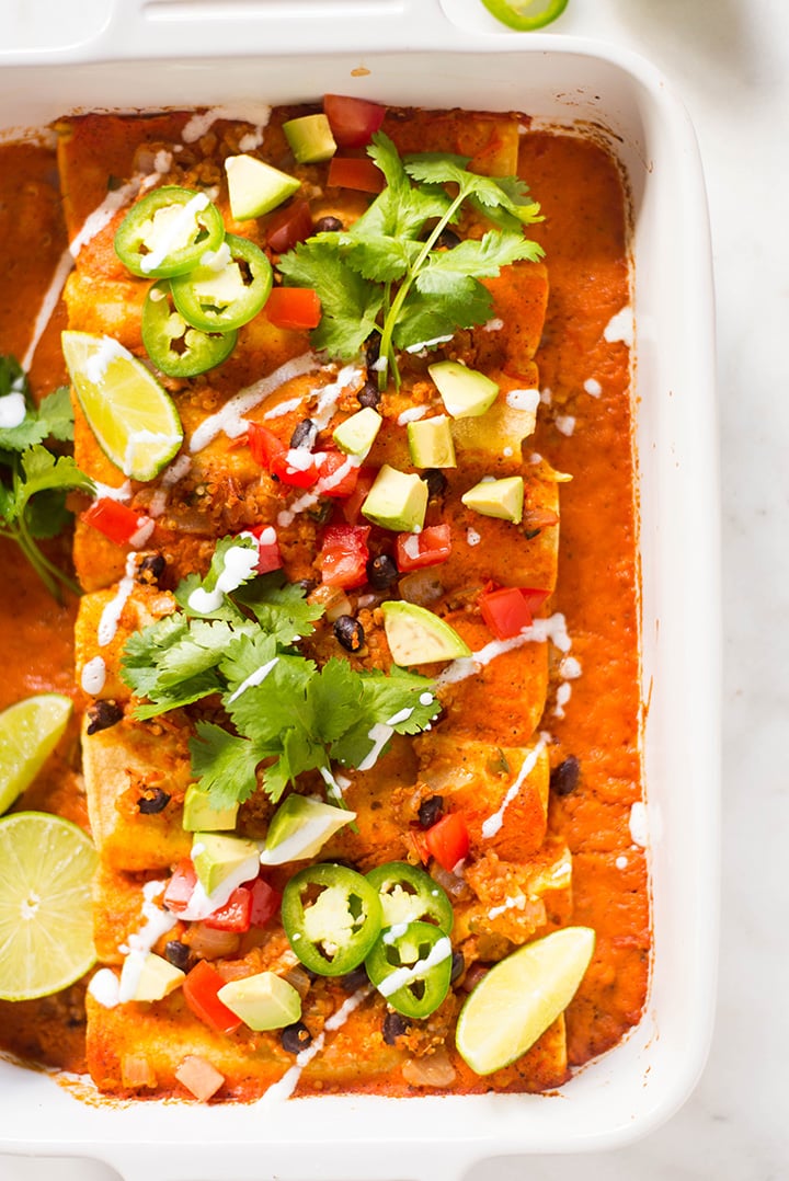 Spicy Quinoa and Black Bean Vegan Enchiladas | This Spicy Quinoa & Black Bean Vegan Enchiladas recipe is my go-to when I want to satisfy my craving for enchiladas while still eating clean. Features a super easy 10-minute Vegan Red Enchilada Sauce. Yum! | A Sweet Pea Chef