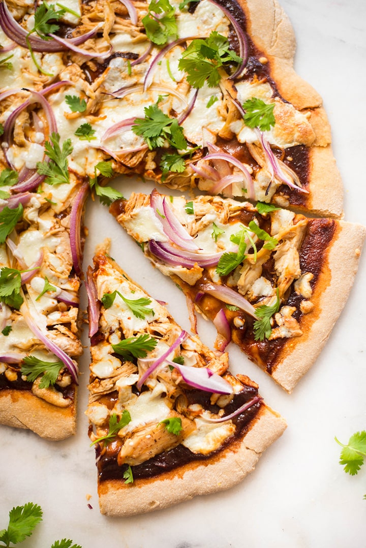Best BBQ Chicken Pizza | Combine whole wheat pizza crust, homemade clean BBQ sauce, seasoned chicken, and fresh red onions and cilantro for the Best BBQ Chicken Pizza ever! | A Sweet Pea Chef