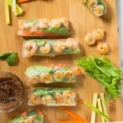 Individual recipe image of one of the healthy spring roll recipes, which is the shrimp spring rolls. Cooked shrimp are one of my favorite protein choices and they make a great flavor and texture combo when paired up with veggies. Try this healthy Shrimp Spring Rolls recipe with a Spicy Almond Dipping Sauce and see for yourself!