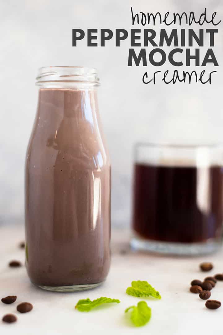 A side image of a bottle filled with healthy Homemade Peppermint Mocha Creamer made with homemade condensed milk, almond milk, pure maple syrup, vanilla extract, arrowroot starch, unsweetened dark cocoa powder, espresso powder and peppermint extract.