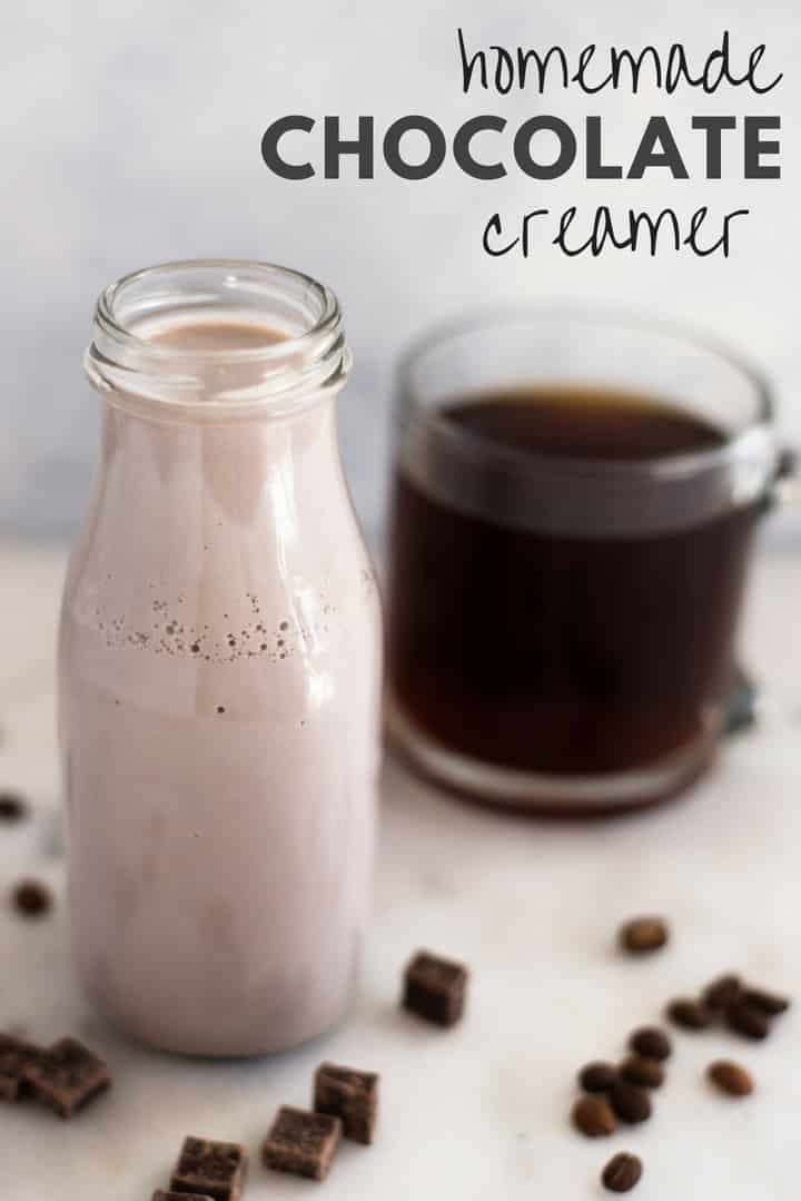 An image of a glass bottle filled with healthy Homemade Chocolate Creamer made with homemade condensed milk, almond milk, vanilla extract, pure maple syrup, arrowroot starch, cocoa powder and vanilla.