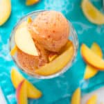 Peach Sorbet | Enjoy this simple and refreshing Peach Sorbet made with only 3 ingredients! This easy fruit sorbet recipe contains no refined sugar, just fresh juicy peaches, raw honey, and lemon juice - it's all you need for this perfect summer dessert! | A Sweet Pea Chef