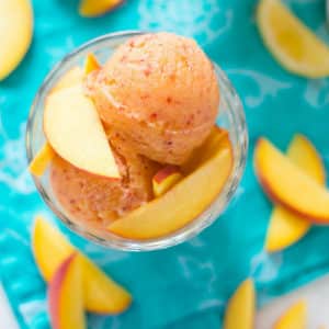 Peach Sorbet | Enjoy this simple and refreshing Peach Sorbet made with only 3 ingredients! This easy fruit sorbet recipe contains no refined sugar, just fresh juicy peaches, raw honey, and lemon juice - it's all you need for this perfect summer dessert! | A Sweet Pea Chef