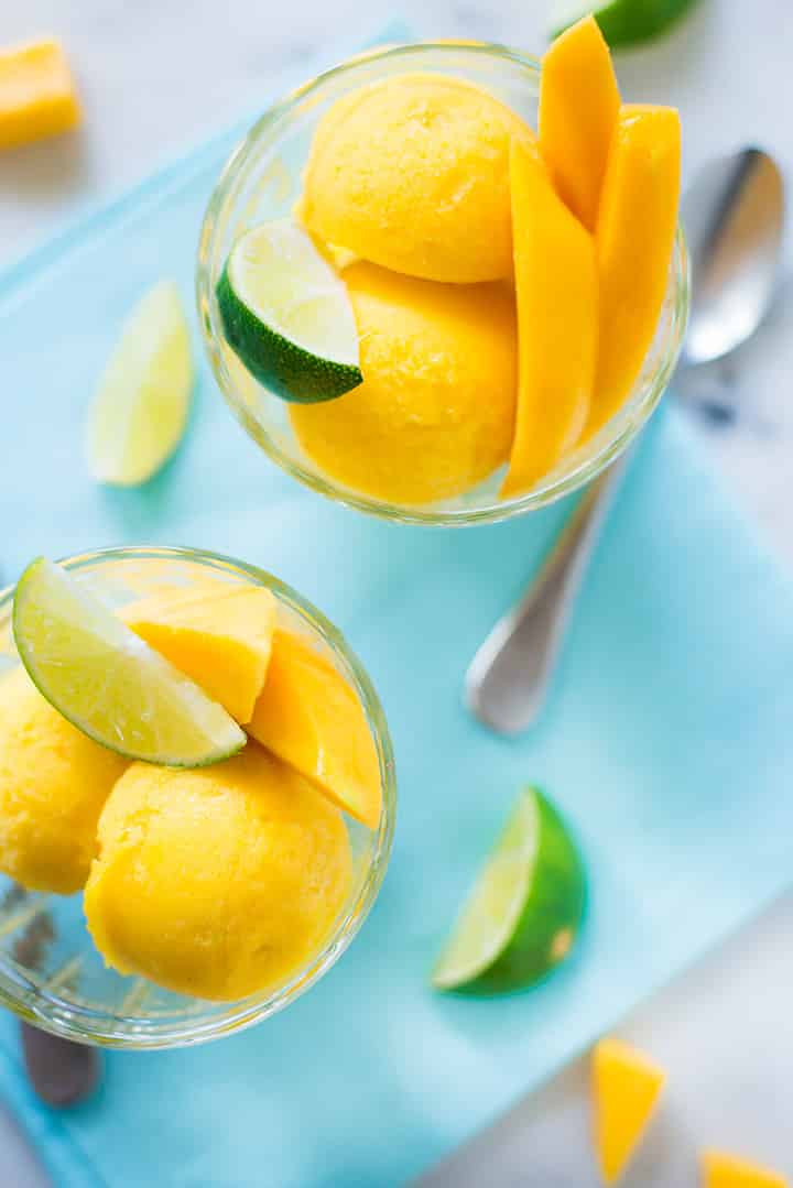 Mango Sorbet | A scoop or two of this rich and sweet Mango Sorbet is everything you need to cool down on a hot summer day! Make it without any added sugar or dairy, and with just 3 simple ingredients. | A Sweet Pea Chef