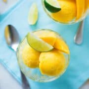 Mango Sorbet | A scoop or two of this rich and sweet Mango Sorbet is everything you need to cool down on a hot summer day! Make it without any added sugar or dairy, and with just 3 simple ingredients. | A Sweet Pea Chef