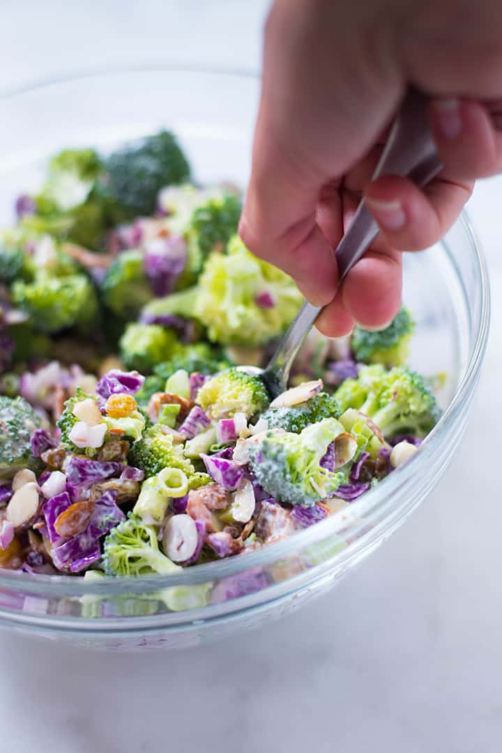 Healthy Broccoli Salad with Greek Yogurt Dressing in a serving bowl, ready to be eaten.