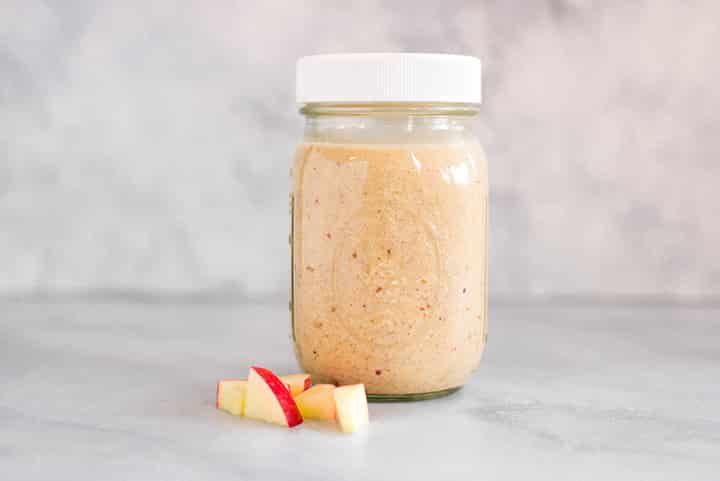 The apple crisp smoothie, one of the Easy Make Ahead Smoothies for Fall, in a jar.