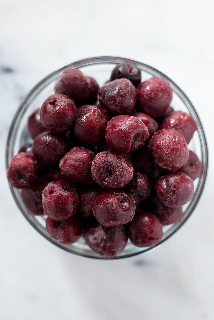 Overhead image of a bowl of dark cherries, a great anti-inflammatory food.