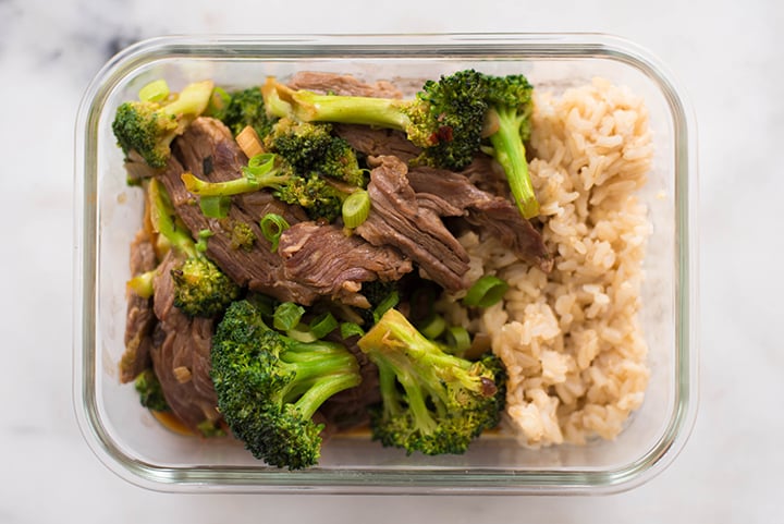 One of the Healthier Restaurant Takeout Dishes made at home - Beef with Broccoli in a meal prep container.