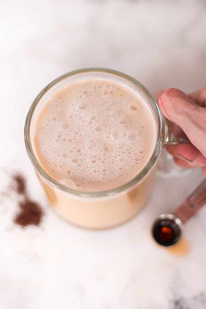 Top view of a healthy vanilla latte in a mug.