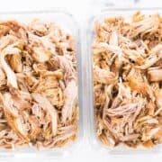 Plain Instant Pot Pulled Pork in meal prep containers.