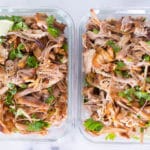 Carnitas Pulled Pork in meal prep containers.
