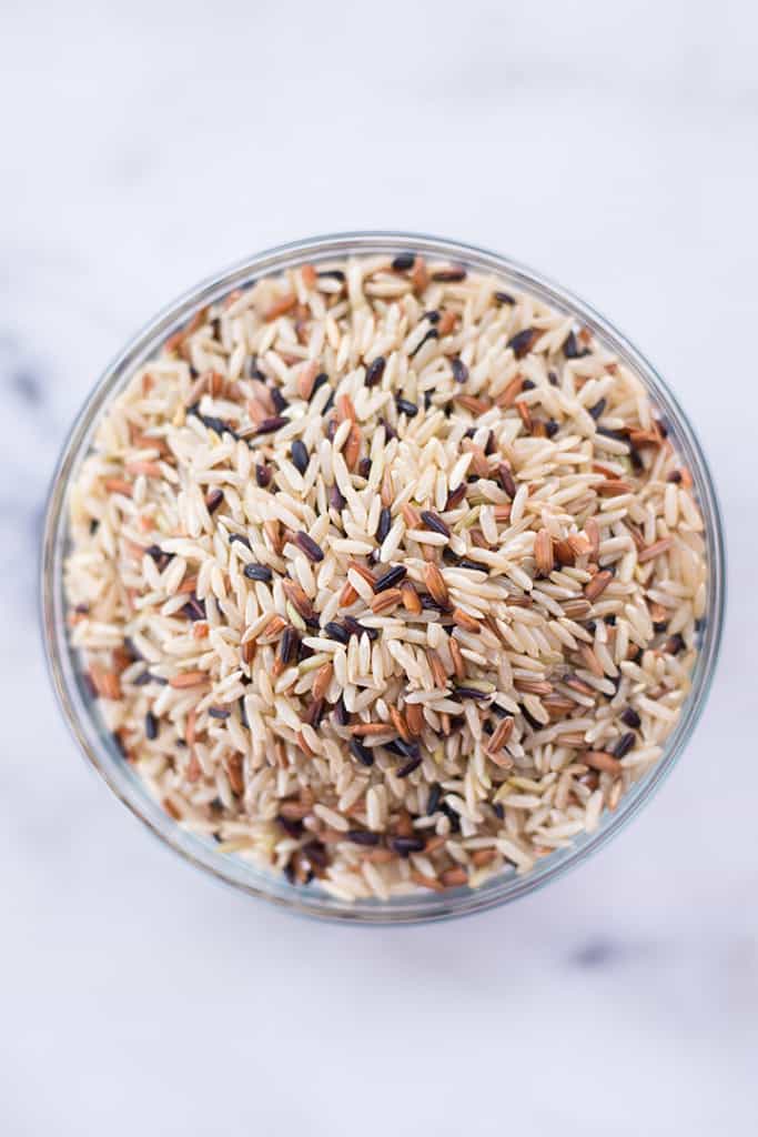 Bowl of wild rice which is an example of a whole grain that reduces inflammation.