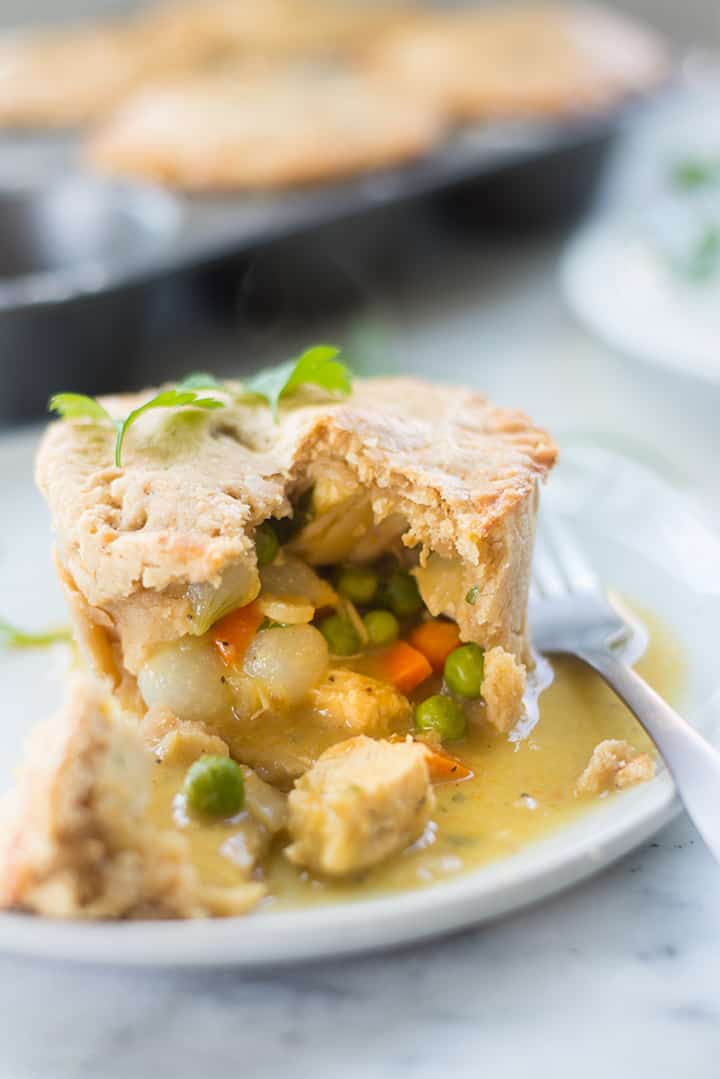Looking for some healthy comfort food? These Mini Chicken Freezer Pot Pies are clean-eating, dairy-free, and can be prepped in bulk ahead for a delicious, filling, and comforting meal.