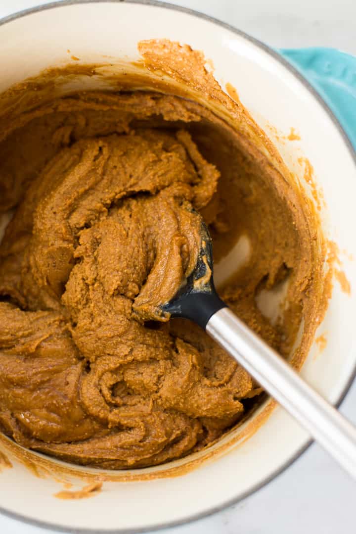 Overhead of saucepan with creamy peanut butter mixture, which will be used to make the top layer of the Easy Chocolate Peanut Butter Fudge.