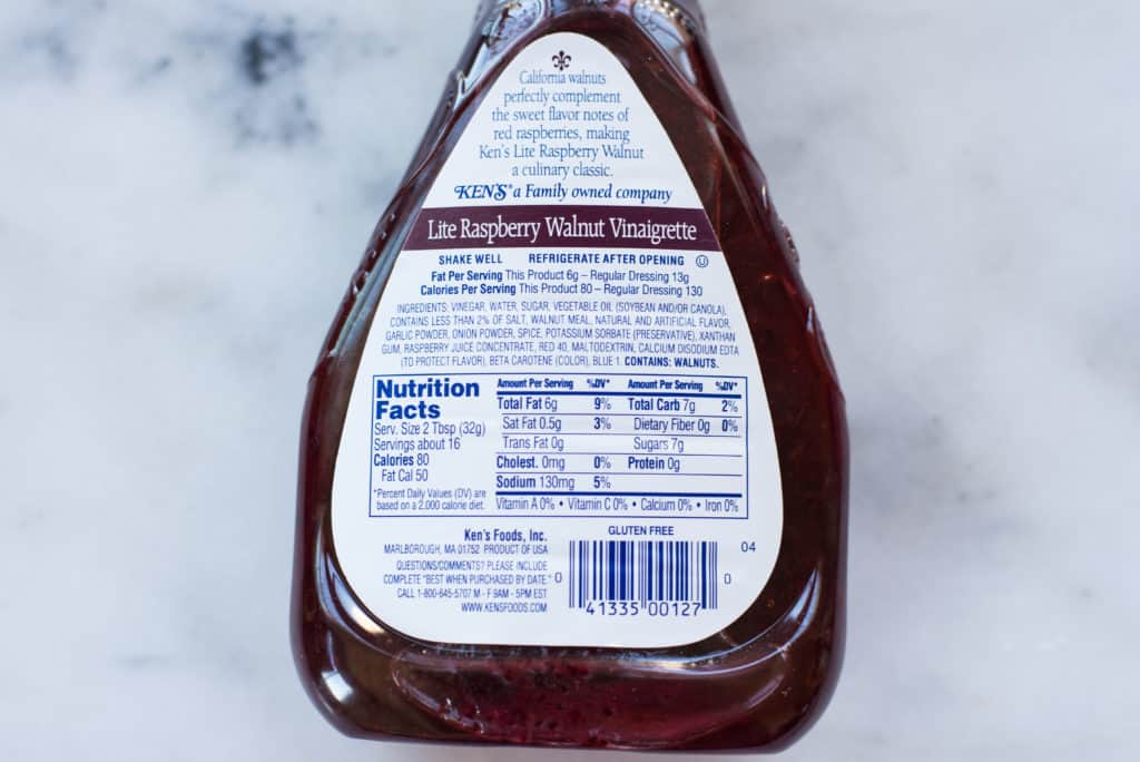 Image of the nutrition label on a bottle of store bought salad dressing, thought to be good for you, but a fake healthy food.