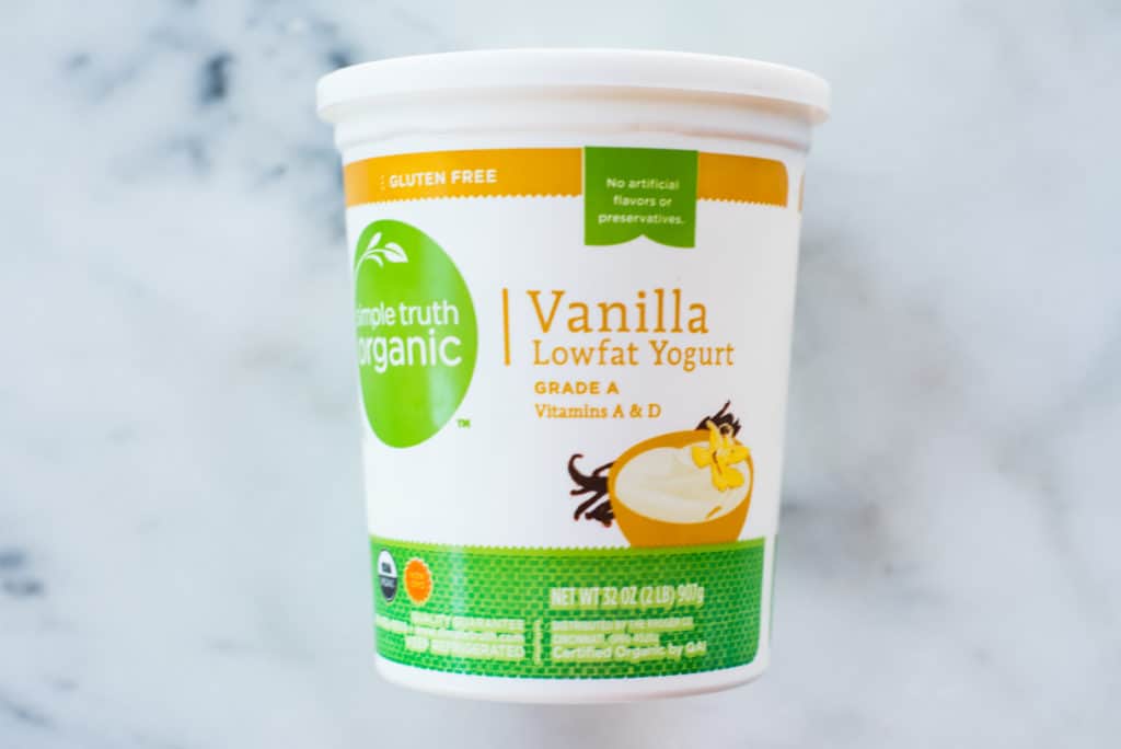 Overhead view of a container of low fat vanilla yogurt which can contain as much as 37 grams of sugar in one serving.