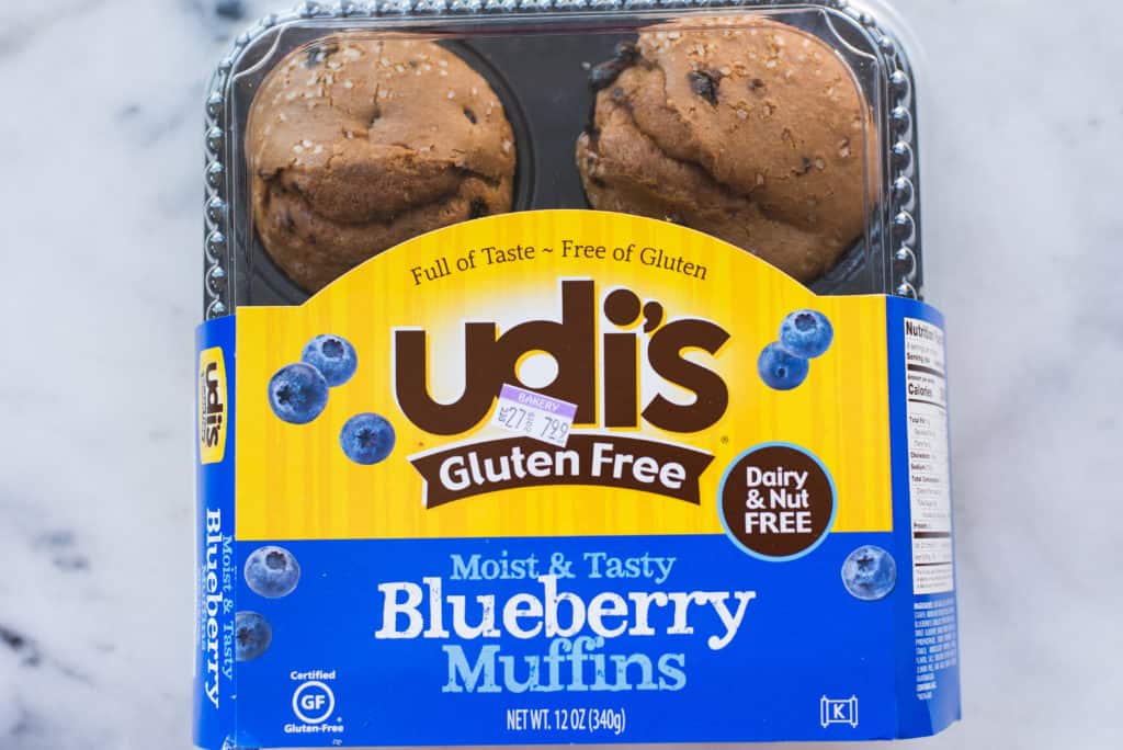 Overhead view of a package of gluten-free muffins, a fake healthy food.