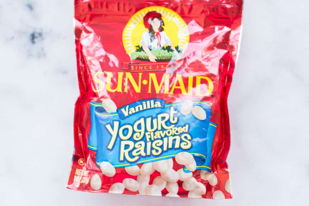 Overhead view of a package of Vanilla Yogurt Flavored Raisins, a fake healthy food.