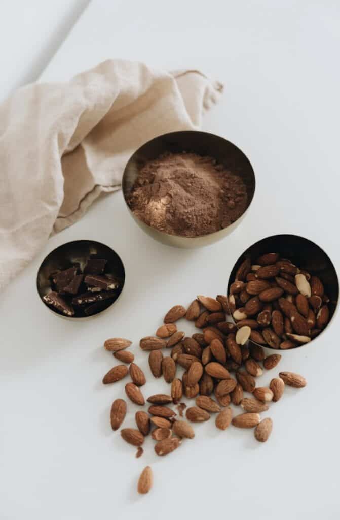 almonds and chocolate in tins