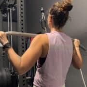 Lacey doing lat pulldowns