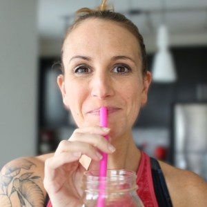 Lacey Baier Weight Loss Coach drinking a smoothie and smiling